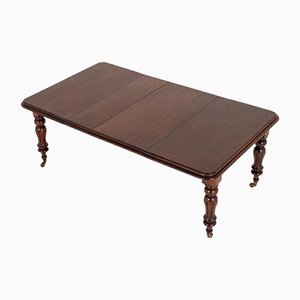 Mesa de comedor extensible William IV antigua