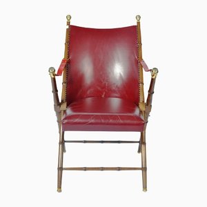 Faux Bamboo Folding Campaign Chair Finished with Brass Studs, Red Leather Cushioned Seat & Brass Mounts from Maison Mercier