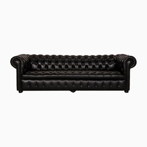 Sofá Chesterfield de cuatro plazas de cuero negro