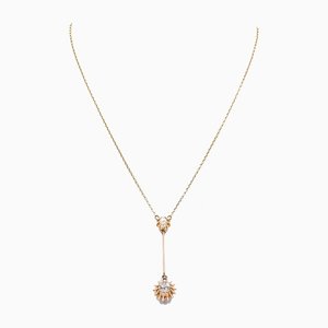 Collana in oro giallo 14 kt con diamante tagliato da 0,50 ct e perla, anni '50