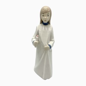 Figura de niña de porcelana con vela, años 80