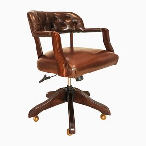 Polished Brown Leather Swivel Button Back Desk Chair with Brass Stud Detailing on a Five Star Base with Castors
