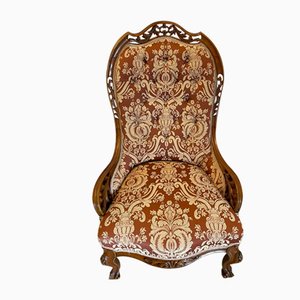 Antiker viktorianischer Stuhl aus geschnitztem Nussholz