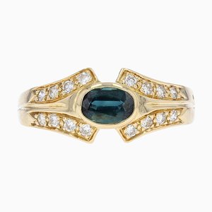 Moderner Ring aus 18 Karat Gelbgold mit Saphir und Diamanten