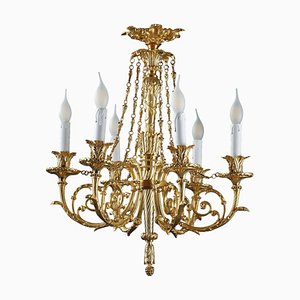 Lámpara de araña estilo Luis XVI de bronce dorado con loros