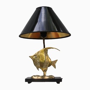 Lámpara de mesa con estatua de pez de latón
