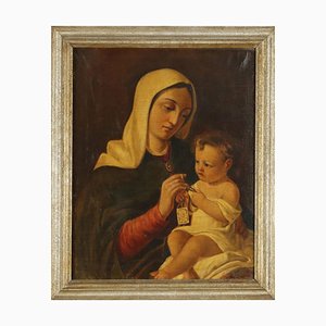 Virgen con el niño, años 20, óleo sobre lienzo, enmarcado