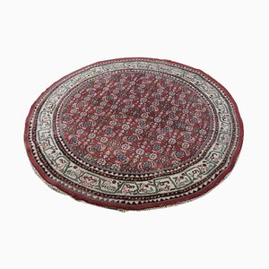 Round Red & Green Rug