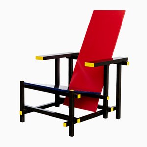 Sedia rossa e blu di Gerrit Thomas Rietveld per Cassina
