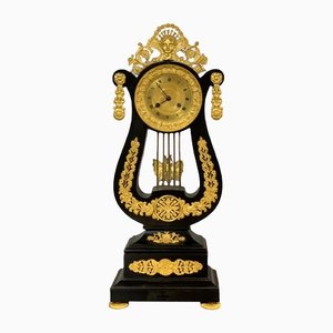 Neoclassical Ebonized Wood and Bronze Lyre Pendulum Clock