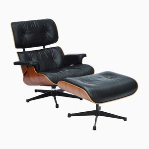 Eames Lounge Chair & Ottoman in Rosewood / Black Leather from Vitra, Set of 2