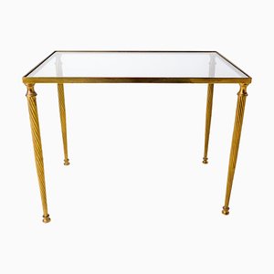 Mesa de centro Mid-Century de vidrio y latón dorado con patas torcidas, 1960