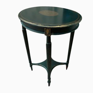 Oval Black Lacquered and Patinated Table