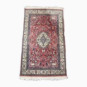 Handgestrickter orientalischer Teppich mit Tier- und Blumenmotiven