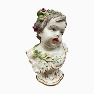 Figura de bebé de porcelana con dorado de Meissen