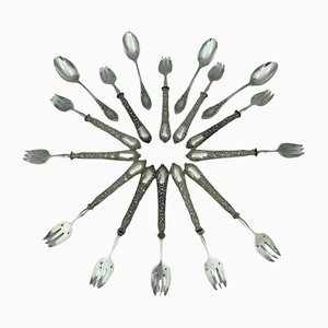 Tenedores para ostras y cucharas para ponche de plata. Juego de 16