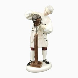 Figurine of the Wigmaker from Royal Doulton