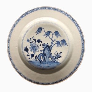 Plato chino antiguo de porcelana con flores azules y blancas