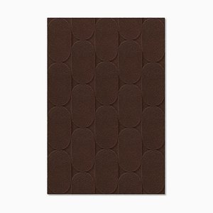 Alfombra texturizada ovalada en chocolate de Marqqa