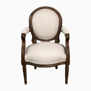 Louis XVI Style Carved Walnut Armchair with Beige Upholstery