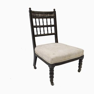 Gilt & Jappaned Wood Low Occasional Chair With Embossed Leather Top Rail by Bruce Talbert