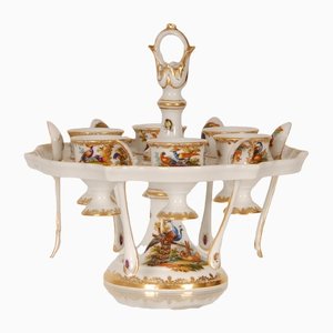 19th Century German Baroque Porcelain Egg Stand or Cruet in the style of Meissen, Set of 13