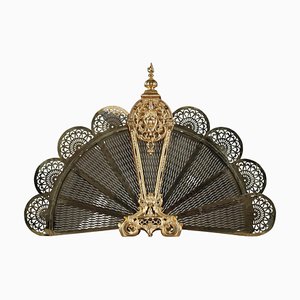 Gilt Bronze and Chased Fan-Shaped Fire Screen with Female Face Decoration