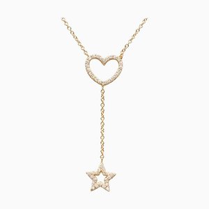 Collar con colgante en forma de corazón y estrella de oro amarillo de 18 kt