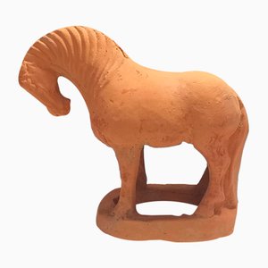 Scultura antica a forma di cavallo