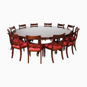 20th Century Diameter Flame Mahogany Dining Table and Chairs, Set of 13