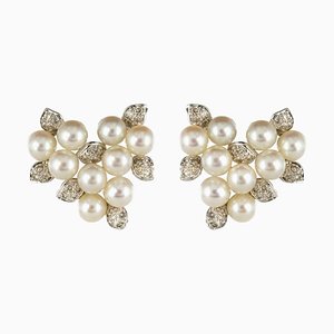 Aretes de oro blanco de 18 kt