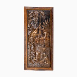 Representation of an African Woman Embossed Copper and Iroko Frame
