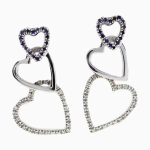 Aretes en forma de corazón de oro blanco de 18 kt. Juego de 2