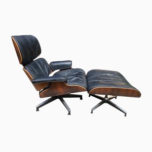 Modell 670 Sessel und Modell 671 Fußhocker von Charles & Ray Eames für Herman Miller, 2er Set
