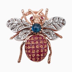 9 Karat Rose Gold and Silver Fly Ring with Diamonds, Sapphires and Rubies