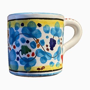 Taza de café con flores en azul cielo de Popolo