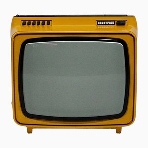 Televisor portátil vintage de plástico amarillo, Austria, años 70