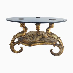 Goldener Cherub Tisch mit Rauchglas und Bronze Ornamenten