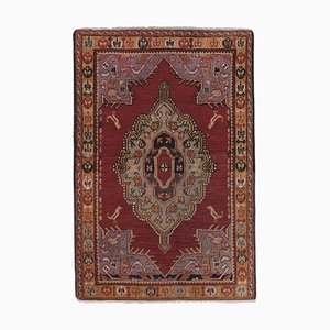 Türkischer Vintage Tier Teppich aus roter Wolle
