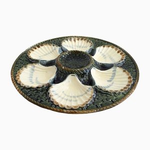 Plato de conchas de hierro y loza de principios del siglo XX de Longchamp
