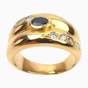 Ring aus 18 Karat Gelbgold mit Saphir und Diamanten