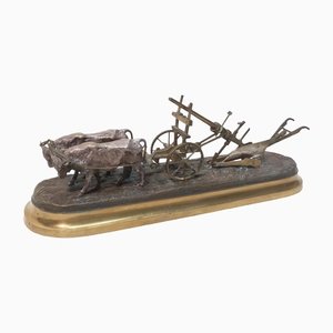 Bueyes enjaezados tirando de un arado, finales del siglo XIX, bronce con tres pátinas