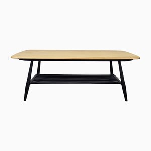 Mesa de centro con patas negras al estilo de Lucian Ercolani para Ercol, años 70