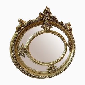 Specchio a sezione ovale con cherubino