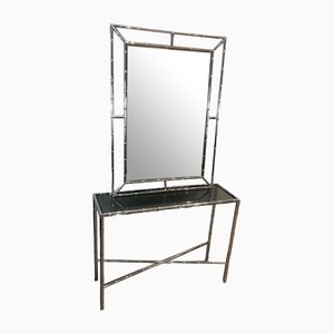 Mesa consola de cromo y vidrio acrílico con espejo. Juego de 2