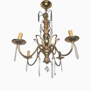 Bronze and Crystal Chandelier in the style of Maison Baguès