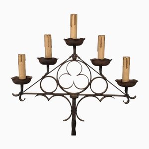 Candelabro neogótico de hierro forjado