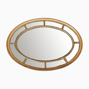 Specchio da parete ovale Regency in legno dorato