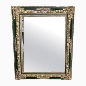 Specchio con cornice verde in legno intagliato e dorato