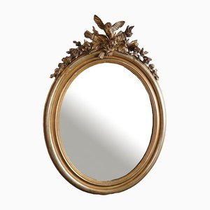 Espejo francés antiguo ovalado con adornos de yeso